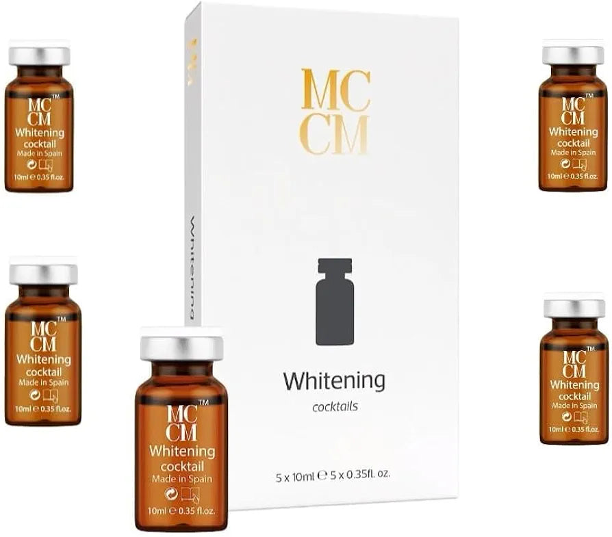 Group view of the MCCM Whitening cocktail box with multiple ampules displayed around it, emphasizing the product's packaging.