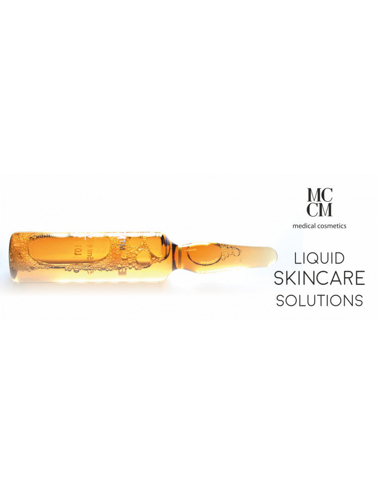 Close-up of a liquid ampoule labeled MCCM, emphasizing its role as a liquid skincare solution and highlighting its antioxidant properties.