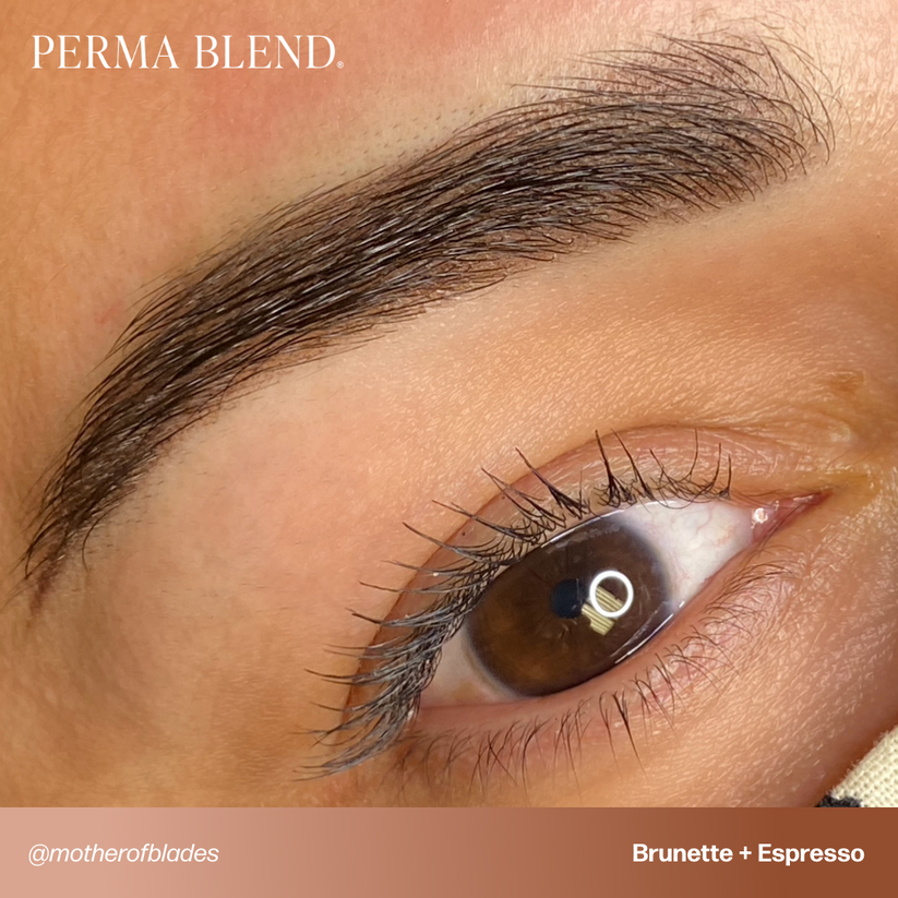 Application of Permablend Espresso pigment onto skin, illustrating its natural-looking color suitable for enhancing eyebrows.