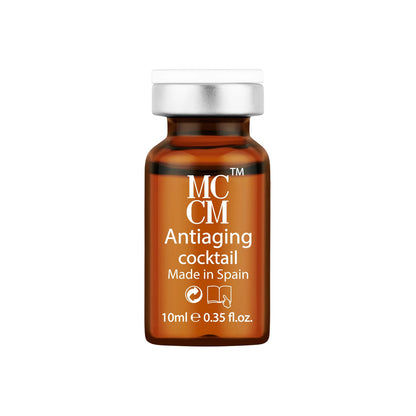 Close-up of the MCCM Antiaging Cocktail vial, showcasing the rich formulation made in Spain.