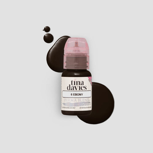 Tina Davies Ebony PMU Pigment set showcasing 7 pre-mixed colors for professional use, perfect for enhancing beauty with permanent makeup.