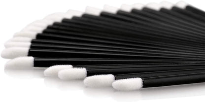 Pack of 50 PMU Lip brushes featuring durable black handles and precision white tips, ideal for flawless lip application.