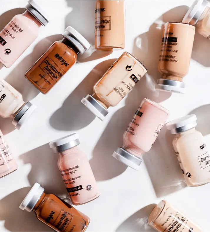 An overhead view of several Stayve pigment ampoules in different shades, ideal for mixing and matching colors for personalized BB Glow treatments. This image celebrates the versatility of the Stayve BB Glow kit, perfect for achieving a luminous complexion with Korean BB Glow products.