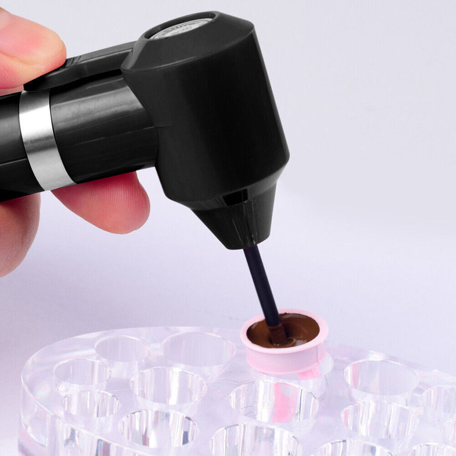 Tattoo Ink Mixer Agitator Machine displayed with various pigments, emphasizing its role in ensuring a smooth Permanent Makeup Pigment Mixture, an essential PMU ink mixture tool for artists.