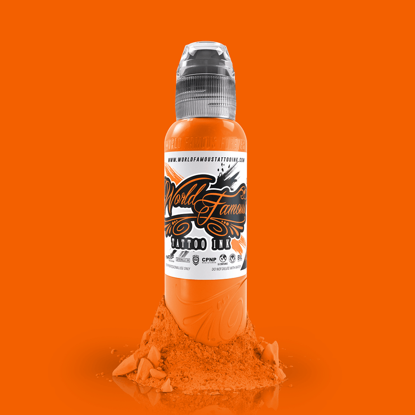 Close-up of WORLD FAMOUS Everest Orange 15ml tattoo ink bottle showcasing its premium quality and bright color, ideal for tattoo artistry.