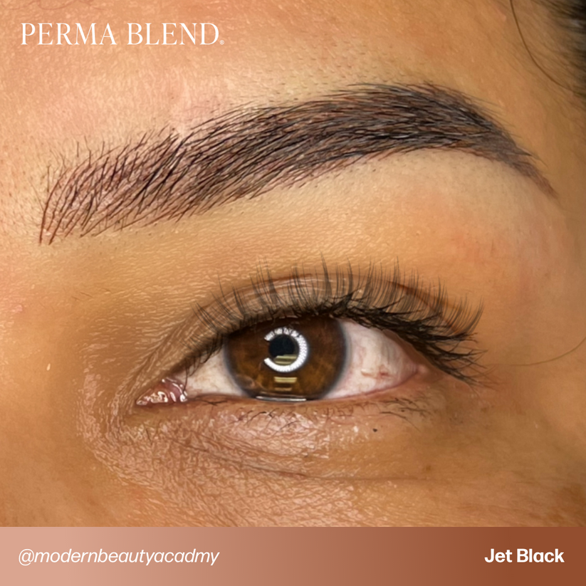 Application of Permablend Jet Black for permanent makeup, demonstrating its rich formulation and warm undertones.
