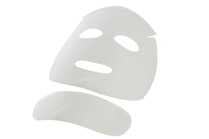 An unwrapped CRYSTAL CARBOXY MASK showcasing the cotton sheet mask ready for application. This visual represents the imported face mask experience from Stayve Korean Masks and Tok Tok Mask.