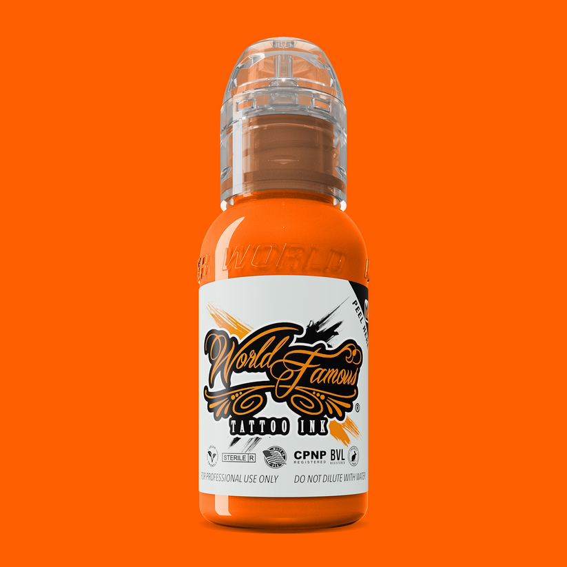 WORLD FAMOUS Everest Orange 15ml tattoo ink with vibrant pigmentation and smooth flow, perfect for tattoo artists.