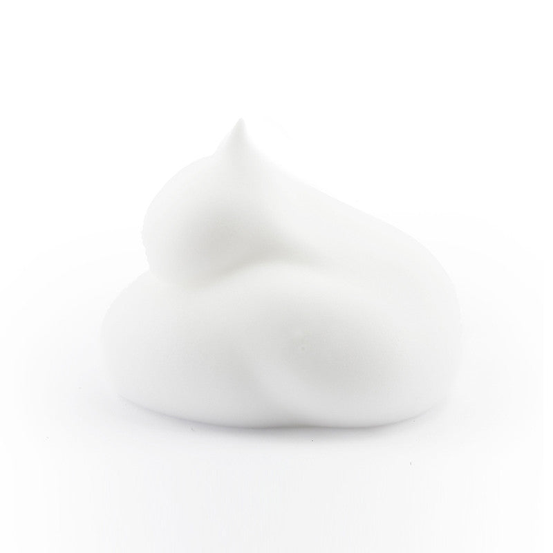 Close-up of Dr. Drawing Bubble Foam Cleanser showing foamy texture and packaging details.