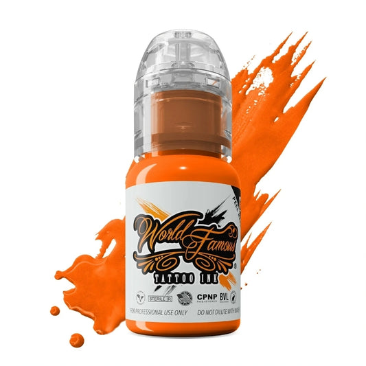 WORLD FAMOUS Everest Orange 15ml Tattoo Ink, high pigment, vegan friendly & fast healing, perfect for vibrant tattoo designs.