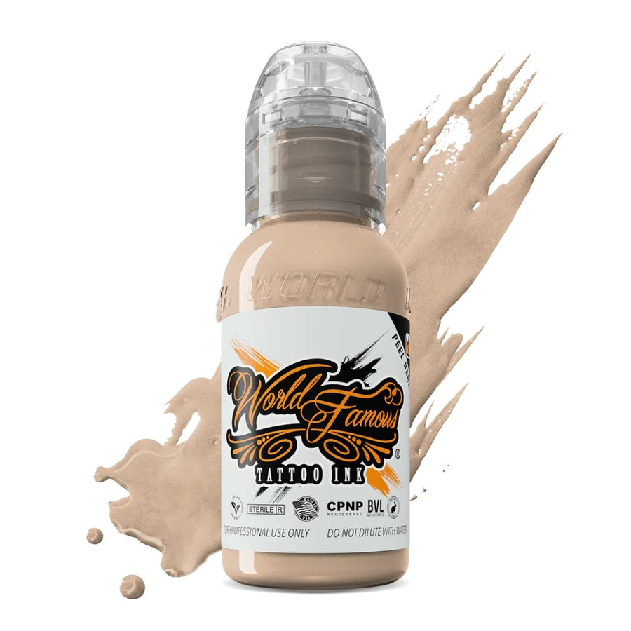 Stylish image of World Famous Tattoo Ink – Mona Lisa Skin - 15ml with secure twist cap in a tattoo studio.
