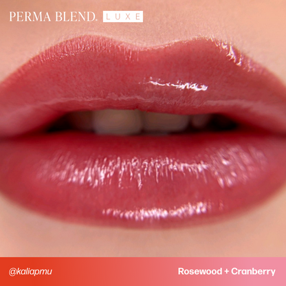 Shelf display of Permablend LUXE Cranberry pigment among other makeup products, perfect for permanent makeup.